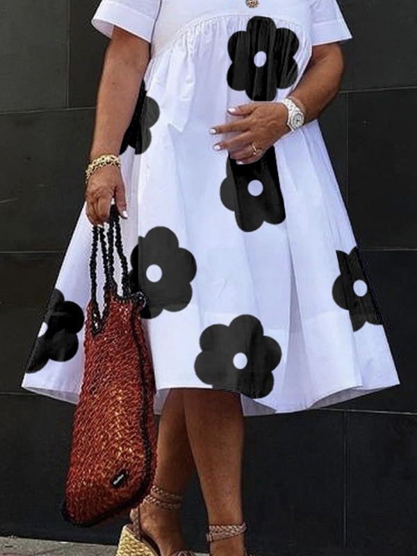 Robe mi-longue ample à manches courtes, à imprimé floral, à col en V