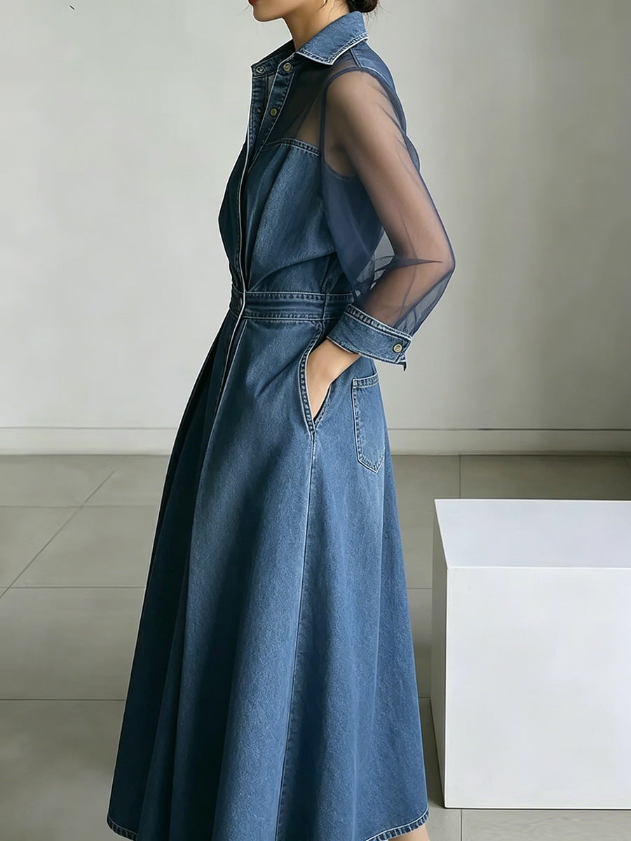 Robe longue boutonnée transparente coupe trapèze, taille haute, à poches, à empiècements, à col revers, couleur unie
