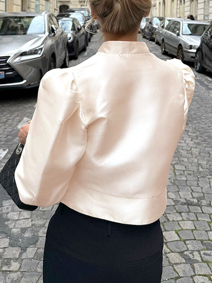 Chemisier ample boutonné à manches longues, à col cheminée, couleur unie