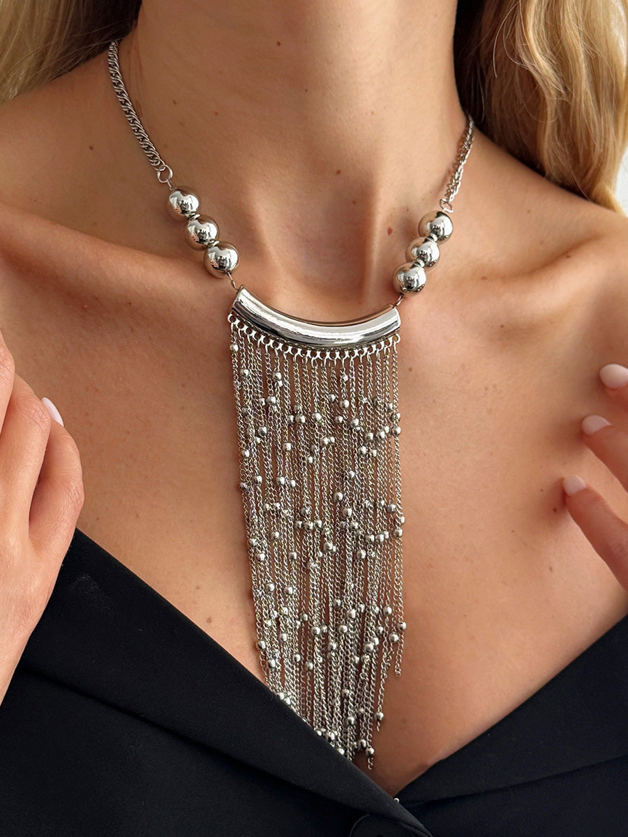 Collier géométrique à pompons