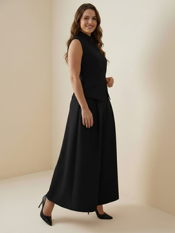 Pantalon ample plissé taille haute, à empiècements, couleur unie