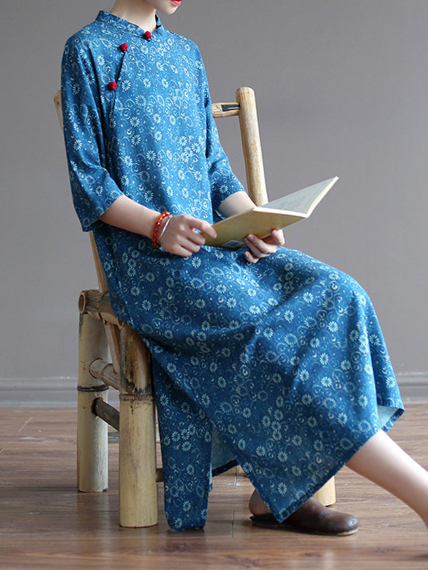 Robe mi-longue originale à col montant et motif floral uni