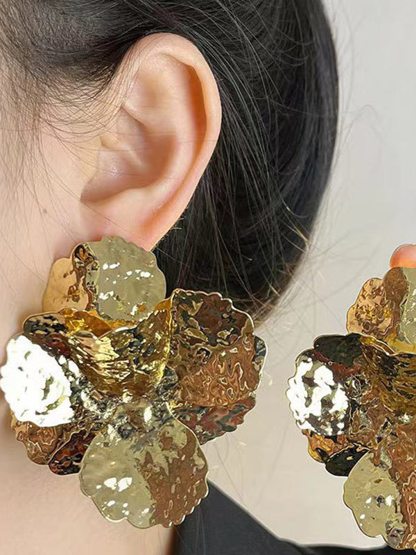 Boucles d'oreilles brillantes en forme de fleur