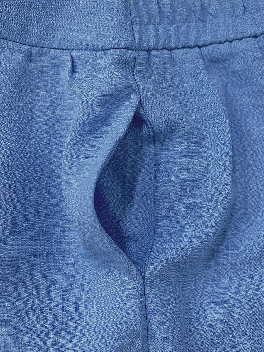 Pantalon ample boutonné à jambes larges, à poches, couleur unie