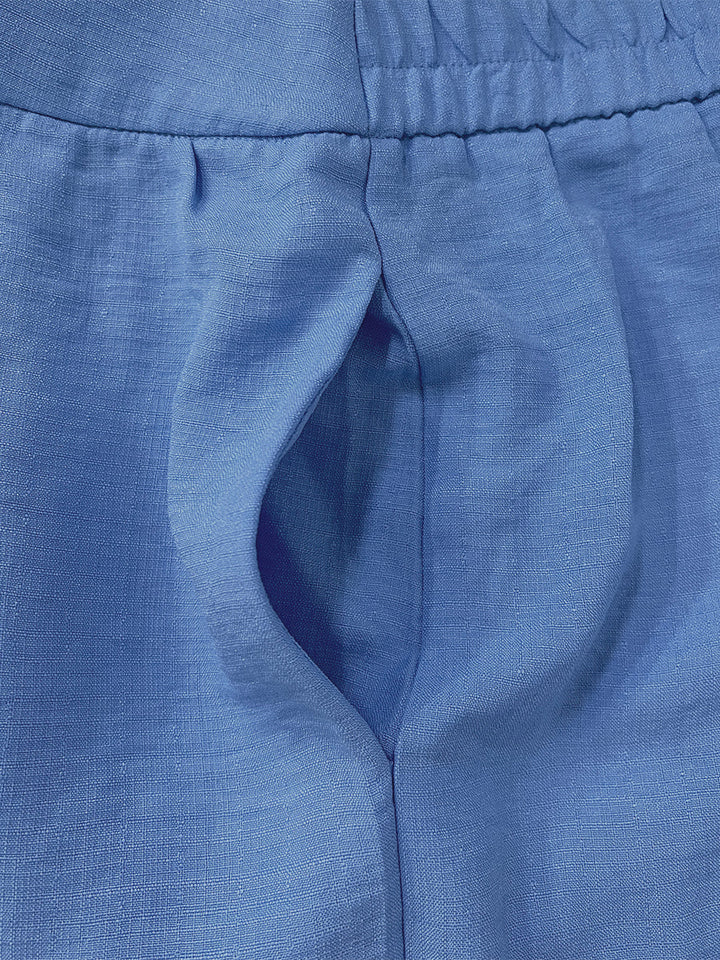 Pantalon ample boutonné à jambes larges, à poches, couleur unie