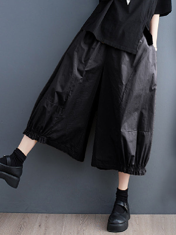 Pantalon décontracté à jambes larges, à empiècements, couleur unie