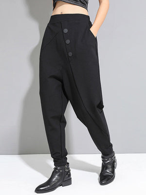 Pantalon sarouel taille haute noir avec boutons