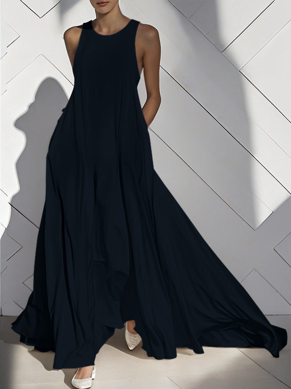 Robe longue ample sans manches, à poches, à empiècements, à col rond, couleur unie