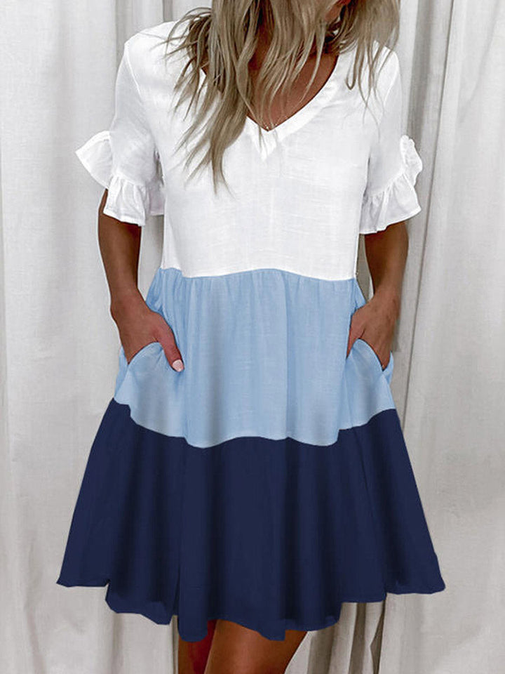 Robe mi-longue plissée imprimée coupe trapèze, taille haute, à poches, à empiècements, à col en V, couleur contrastée