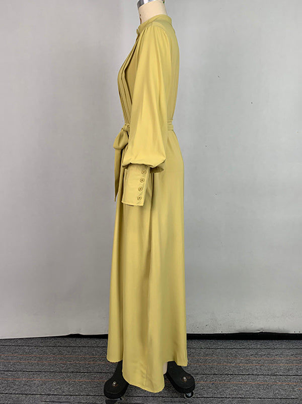 Robe longue boutonnée plissée coupe trapèze, à manches longues, à poches, à taille nouée, à col en V, couleur unie