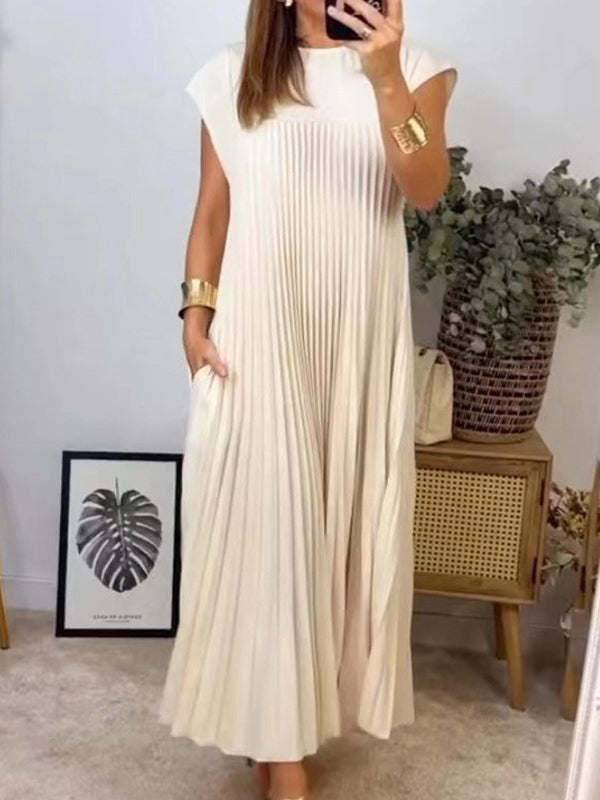 Robe longue plissée coupe trapèze, taille haute, à poches, à empiècements, à col rond, couleur unie
