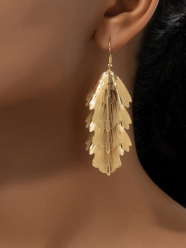Boucles d'oreilles superposées texturées couleur unie