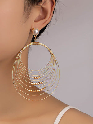 Boucles d'oreilles géométriques à coupe irrégulière