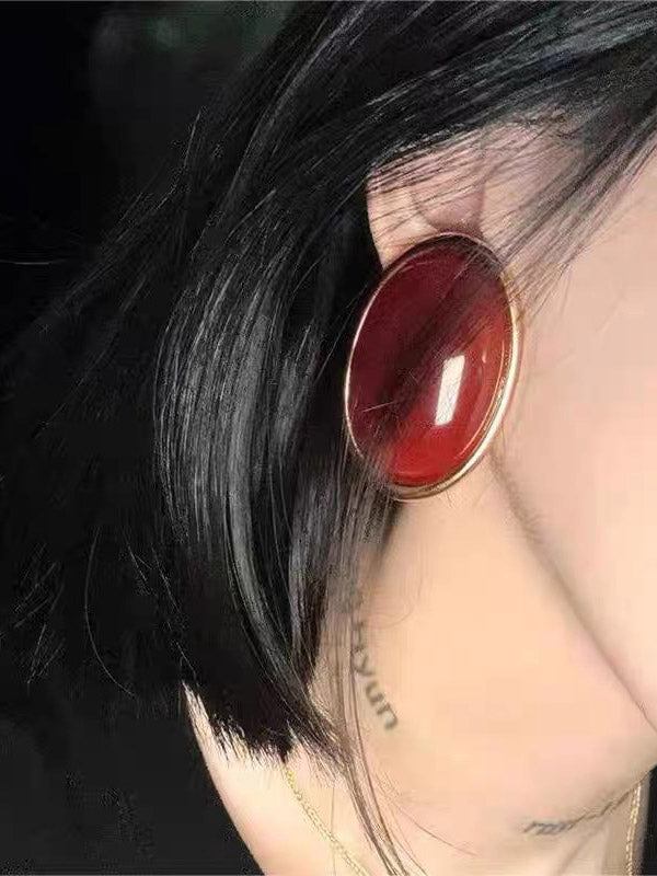 Boucles d'oreilles géométriques à empiècements