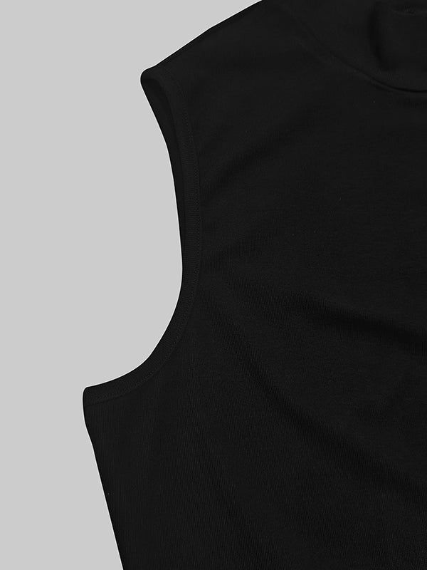 Robe longue moulante ajourée plissée sans manches, à empiècements, à col cheminée, couleur unie