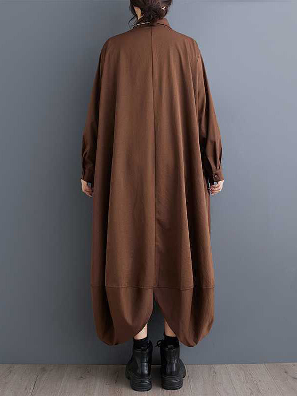 Robe chemise boutonnée coupe trapèze, à manches longues, à poches, à empiècements, à col revers, couleur unie