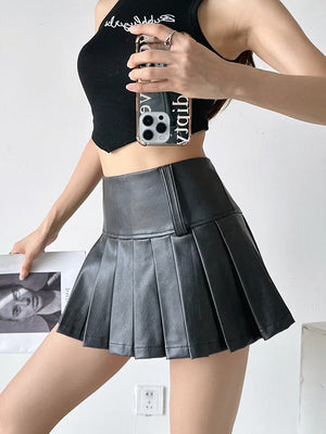 Jupe plissée coupe trapèze, taille haute, couleur unie