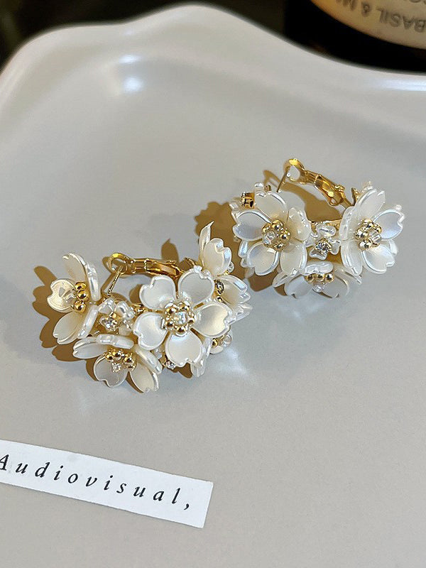 Boucles d'oreilles pendantes en forme de fleur, à strass