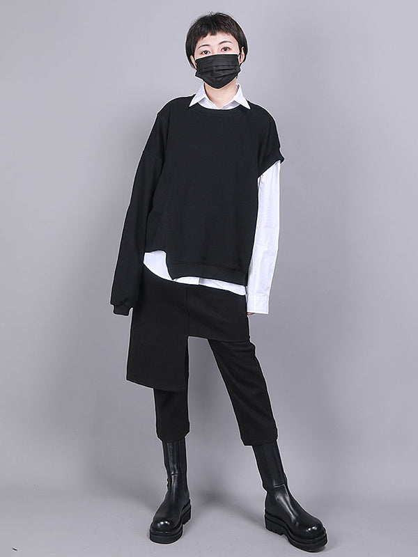 Jupe-culotte noire asymétrique taille empire, effet deux pièces