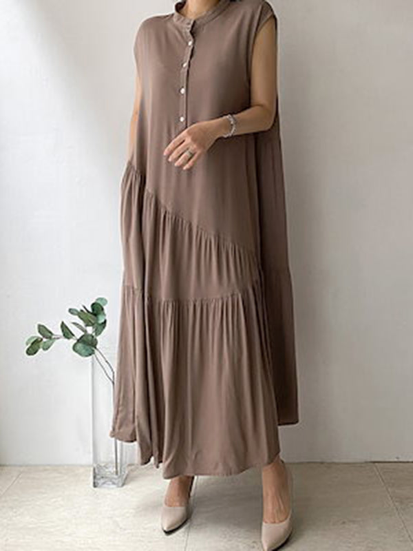Robe mi-longue ample boutonnée plissée volantée coupe trapèze, à empiècements, à volants étagés, à col montant, couleur unie