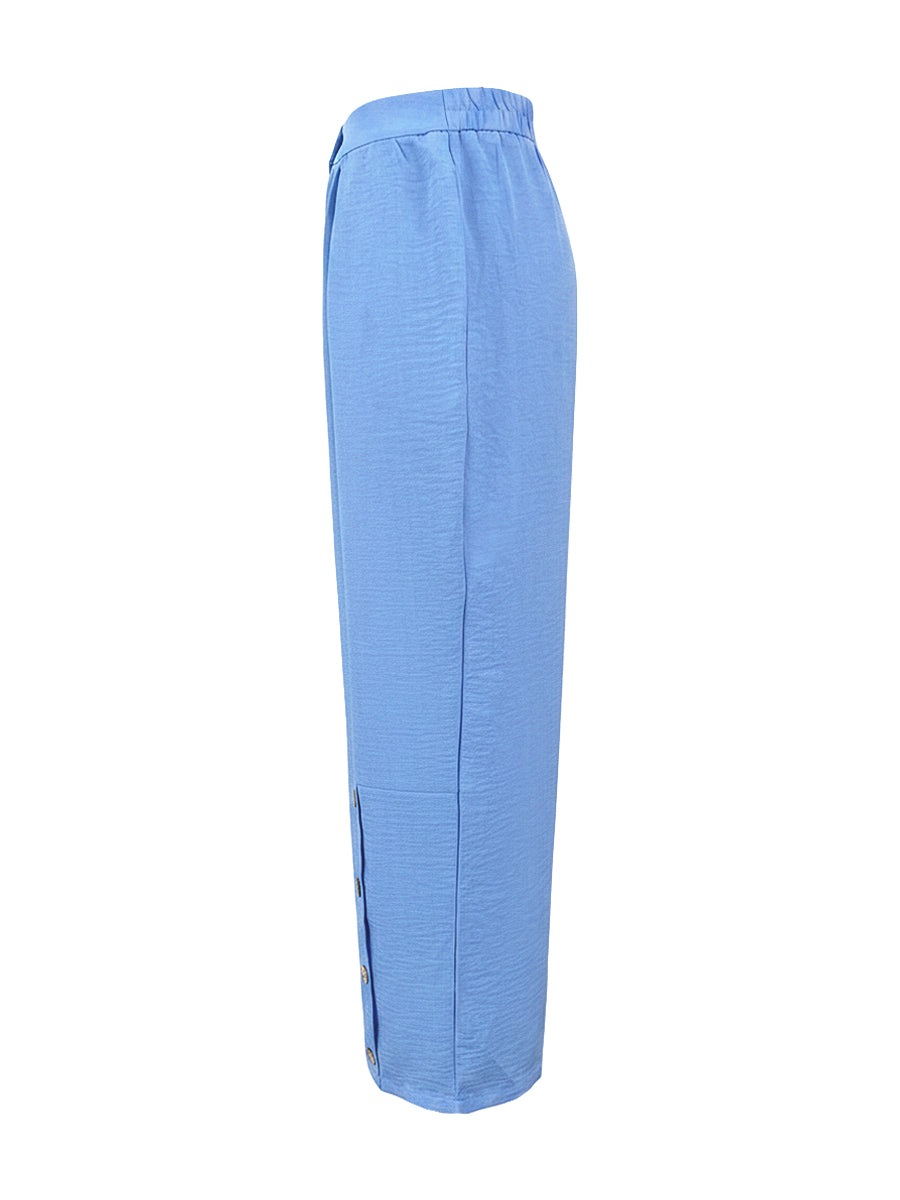 Pantalon ample boutonné à jambes larges, à poches, couleur unie