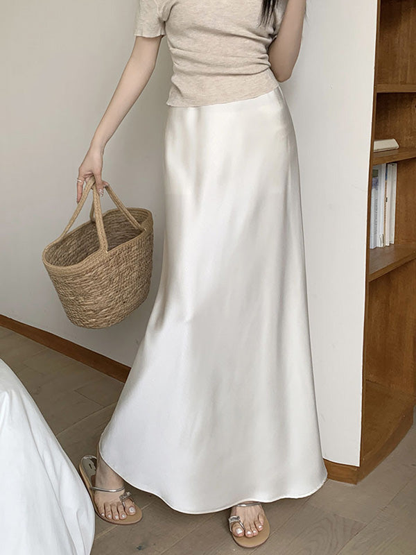 Jupe coupe sirène, à taille élastique, couleur unie
