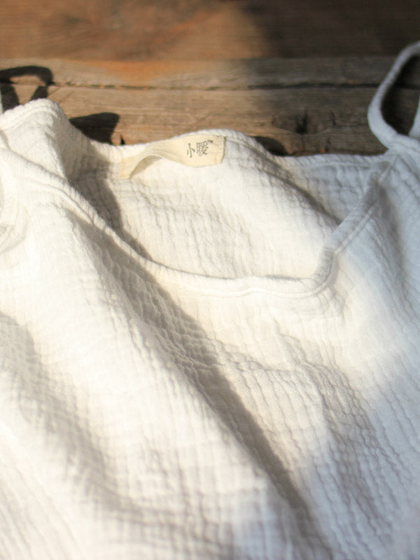 Robe courte ample vintage, à fines bretelles, sans manches, couleur unie