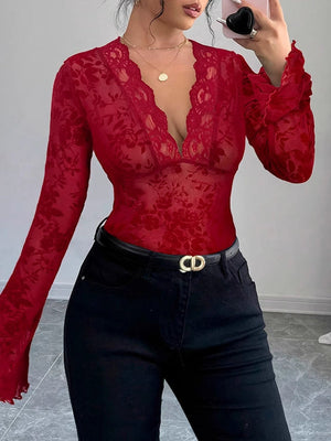 T-shirt à manches évasées, à manches longues, à décolleté en V profond, couleur unie