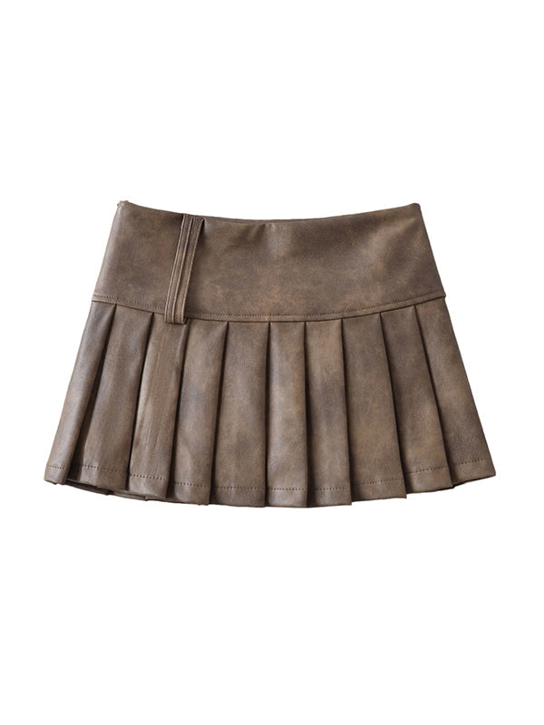 Jupe plissée coupe trapèze, taille haute, couleur unie