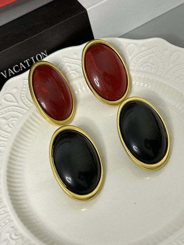 Boucles d'oreilles géométriques à empiècements