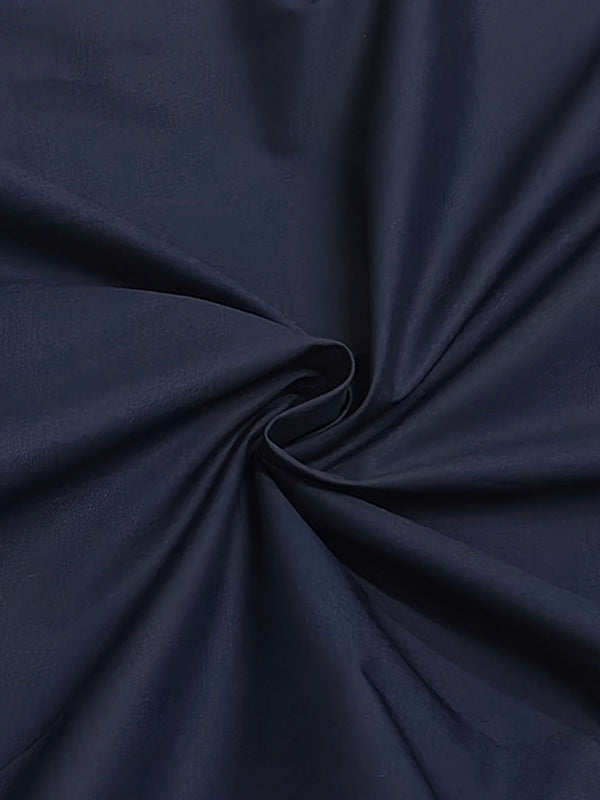 Robe mi-longue ample boutonnée à manches longues, à poches, à col revers, couleur unie