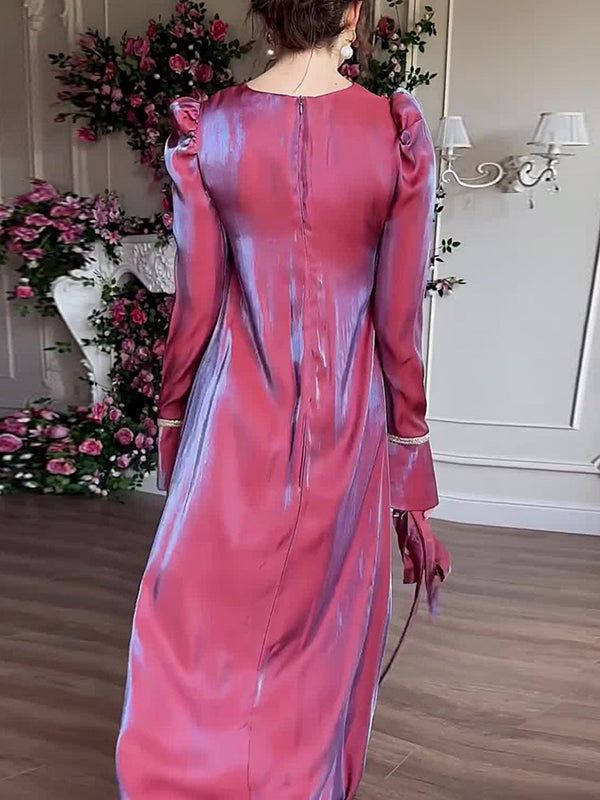 Robe longue plissée coupe trapèze, à manches longues, à taille nouée, à fermeture éclair, à col rond, couleur unie