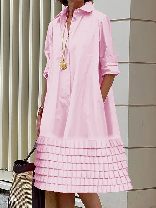 Robe chemise superposée plissée coupe trapèze, à manches longues, à poches, à empiècements, à col revers, couleur unie