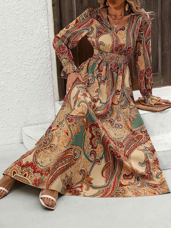 Robe longue ample imprimée à manches bouffantes, à taille élastique, à col en V