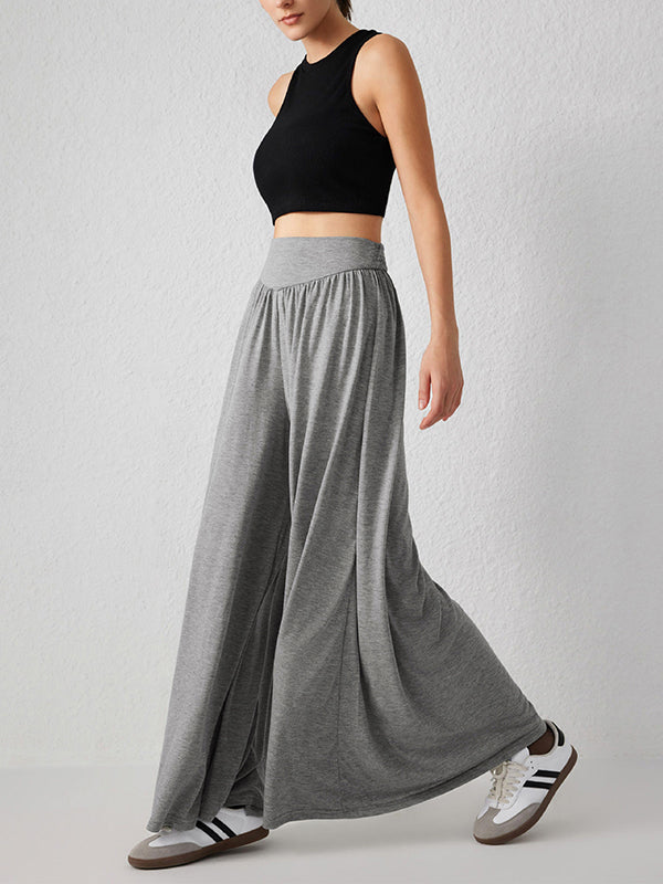 Pantalon ample plissé taille haute, à poches, à empiècements, couleur unie