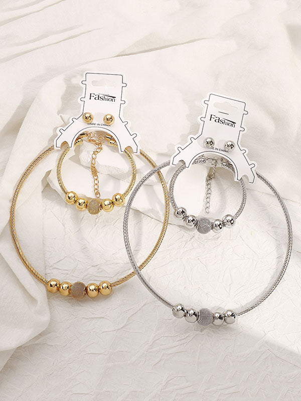 Ensemble trois pièces géométrique – collier + bracelet + boucles d'oreilles