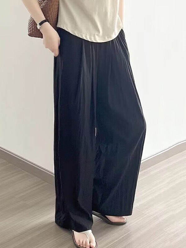 Pantalon ample plissé taille haute, à taille élastique, à poches, couleur unie