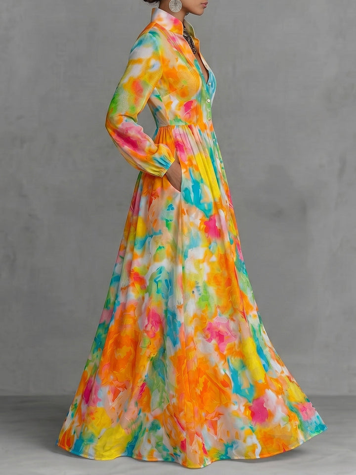 Robe chemise boutonnée plissée imprimée coupe trapèze, à manches longues, à poches, à col revers, couleur contrastée