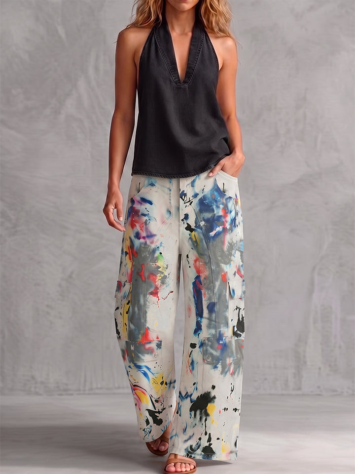 Bas de pantalon en Jean taille haute, jambe large, boutonné, couleur contrastée, poches imprimées graffitis