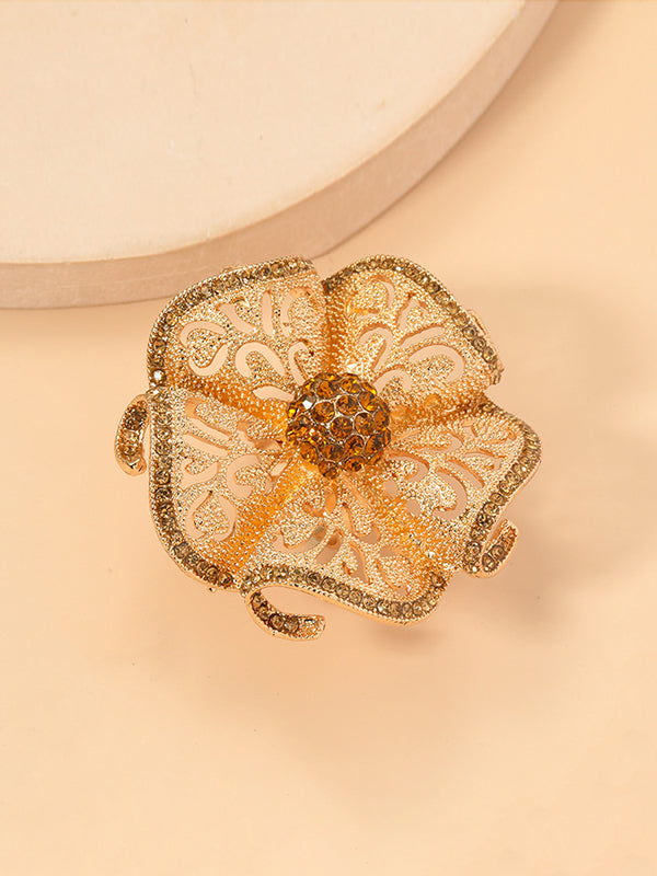 Bague réglable ajourée en forme de fleur, à strass