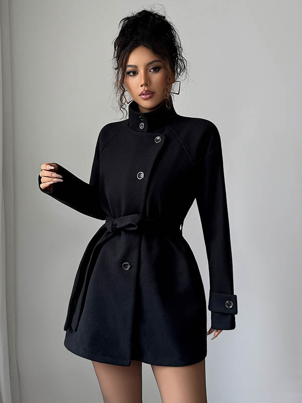 Veste asymétrique boutonnée à taille élastique, taille haute, à taille nouée, à col montant, couleur unie