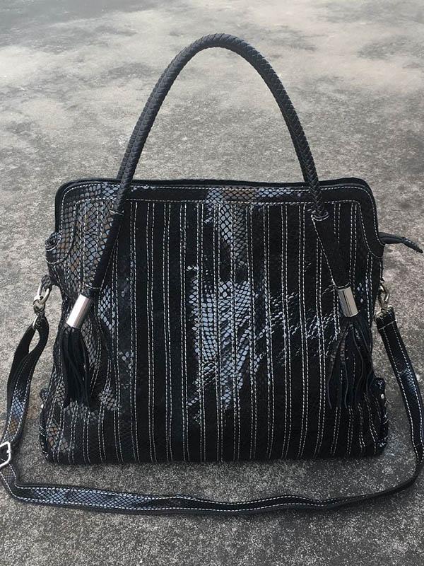 Sac en cuir à bandoulière rayé à empiècements