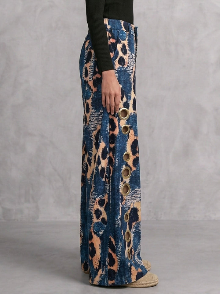 Pantalon ajouré boutonné à fermeture éclair, à empiècements, à poches, à imprimé léopard, à jambes larges, taille haute
