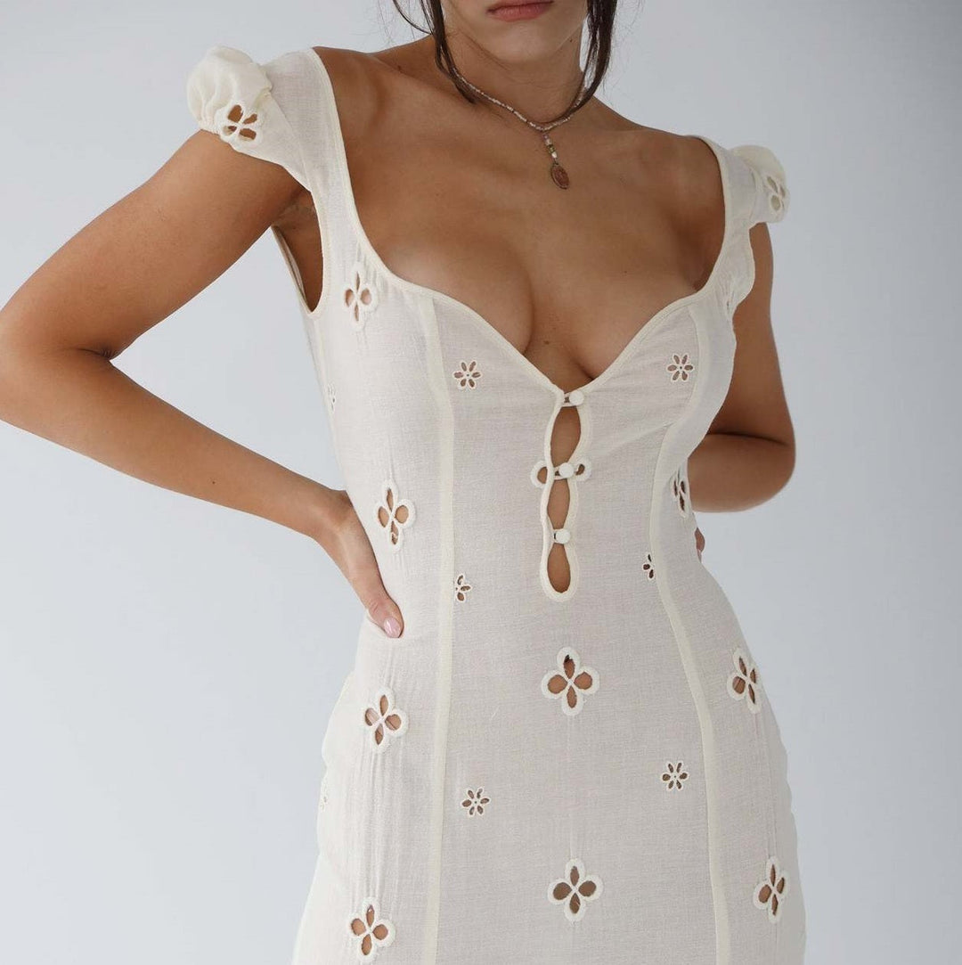 Bianca - Robe midi blanche brodée avec découpes