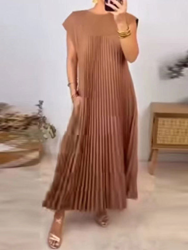 Robe longue plissée coupe trapèze, taille haute, à poches, à empiècements, à col rond, couleur unie
