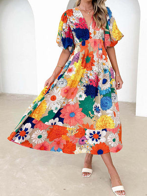 Robe longue plissée coupe trapèze, taille haute, à imprimé floral, à empiècements, à fermeture éclair, à col en V