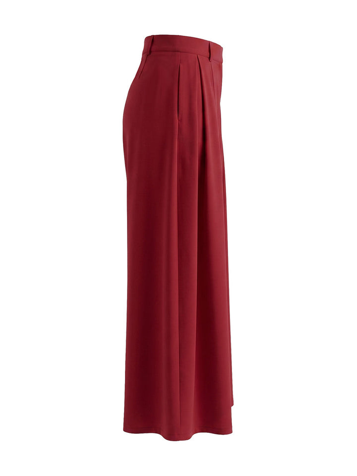 Pantalon élégant ample taille haute, à jambes larges, couleur unie