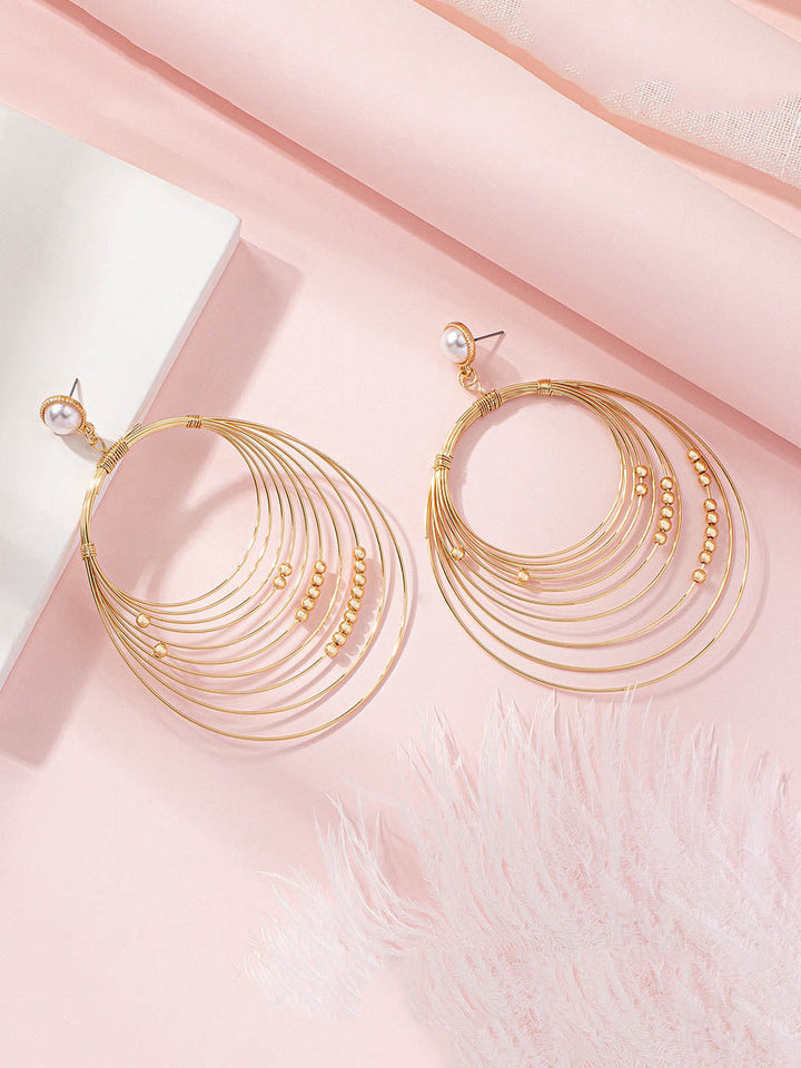 Boucles d'oreilles géométriques à coupe irrégulière
