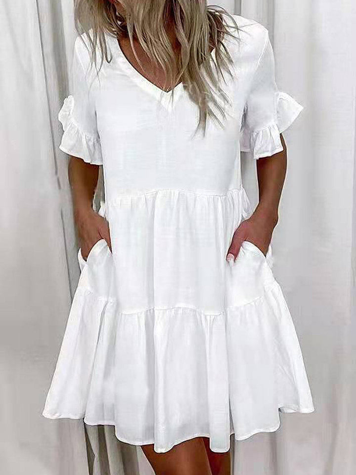 Robe mi-longue plissée imprimée coupe trapèze, taille haute, à poches, à empiècements, à col en V, couleur contrastée