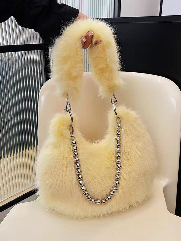 Sac à main perlé à empiècements